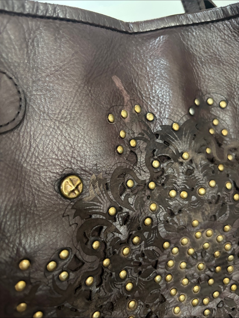 Platania Italian leather bag studded details and a laser cut-out floral design - Picture 11 of 11
